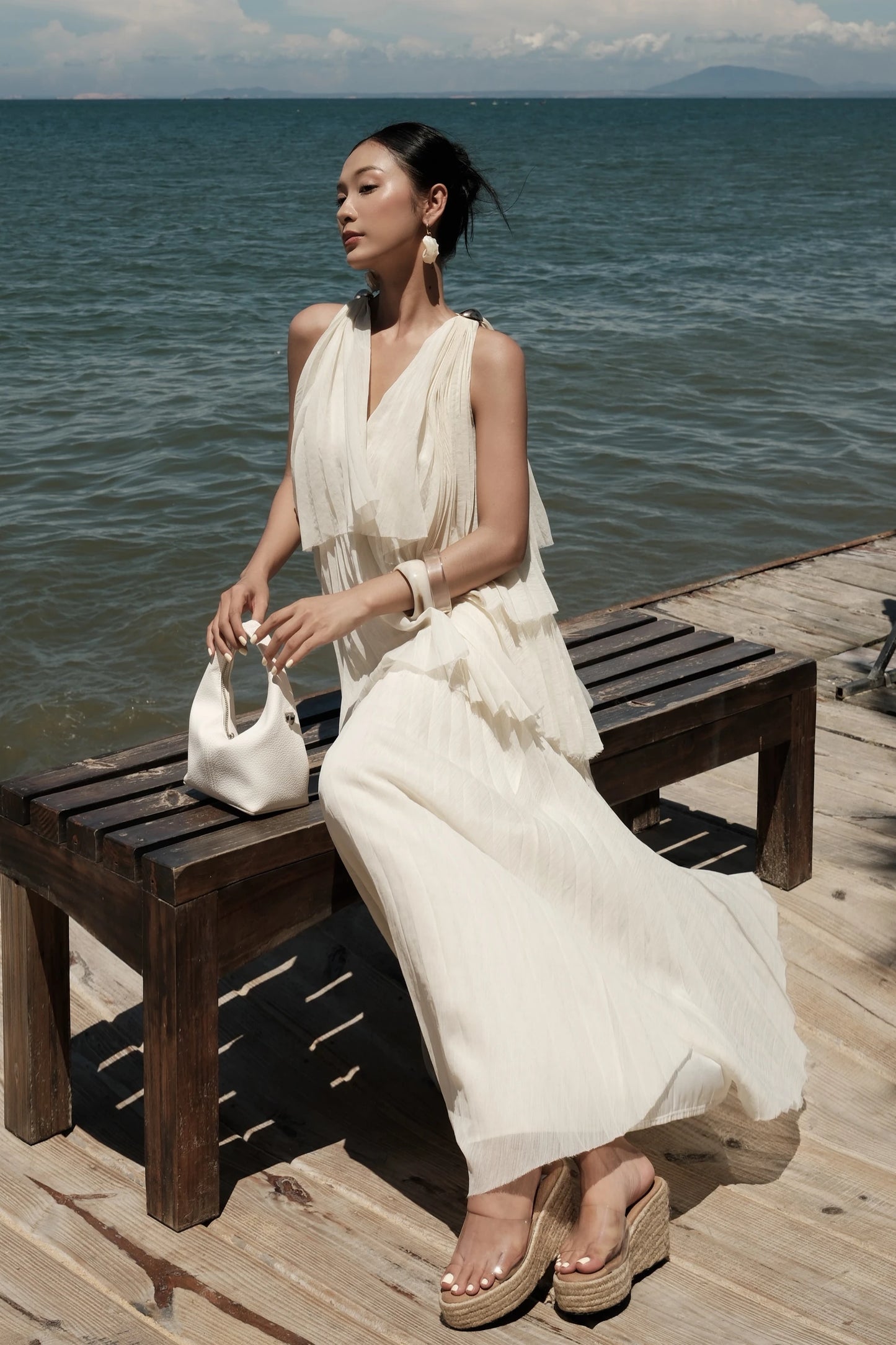 Poeme Tiered Dress in cream - seated pose
