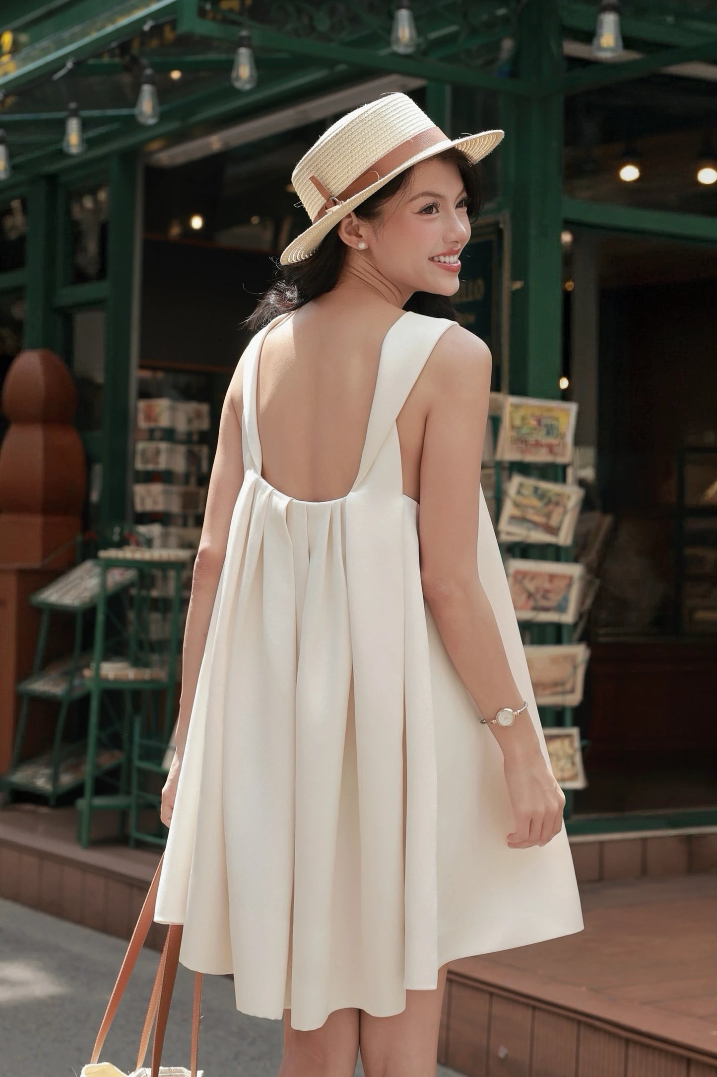 Ammie Babydoll Dress in cream - back view