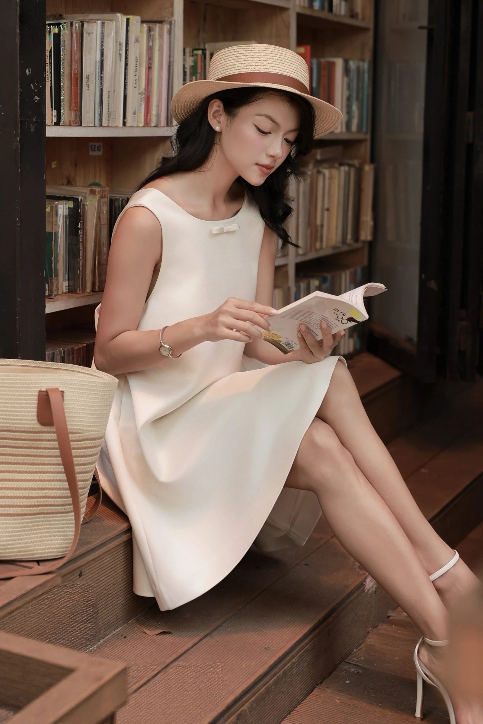 Ammie Babydoll Dress in cream - seated pose